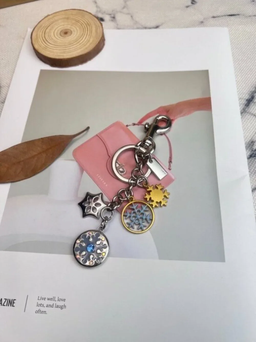 Coach Silver-Tone & Light Blue Snowflake Charm Keychain with Gold Accent